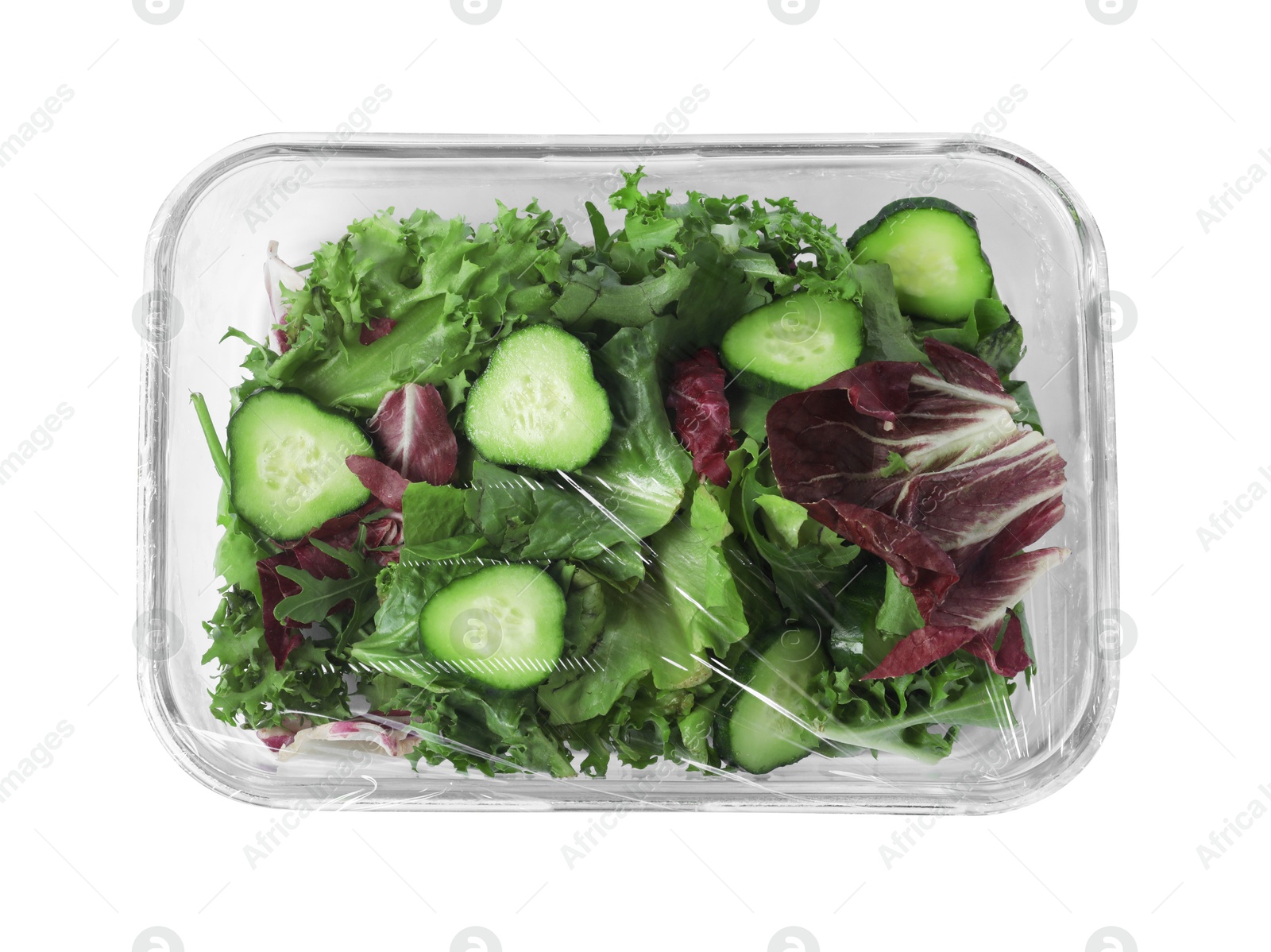 Photo of Glass container of fresh salad with plastic food wrap isolated on white, top view