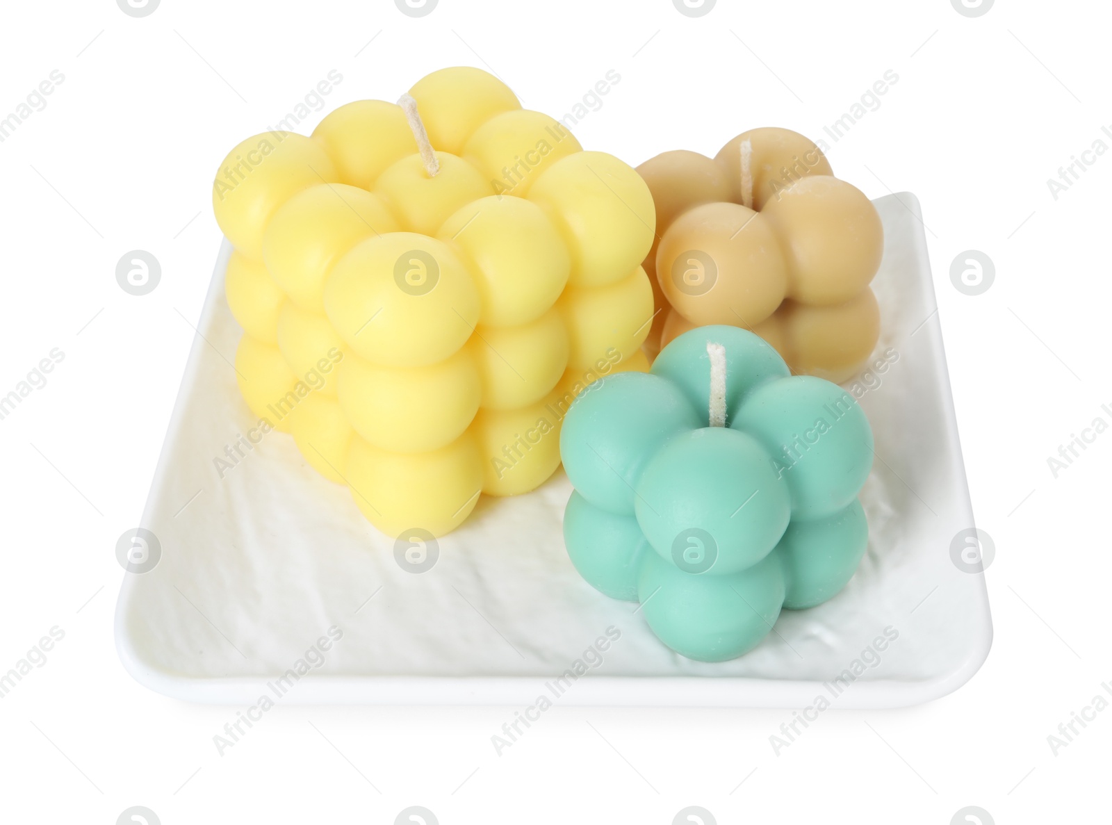 Photo of Three colorful bubble candles isolated on white