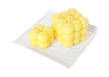 Photo of Two yellow bubble candles isolated on white