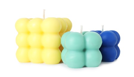 Photo of Three colorful bubble candles isolated on white