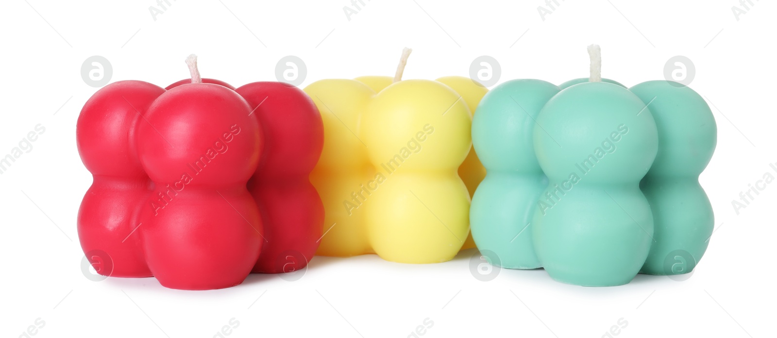 Photo of Three colorful bubble candles isolated on white