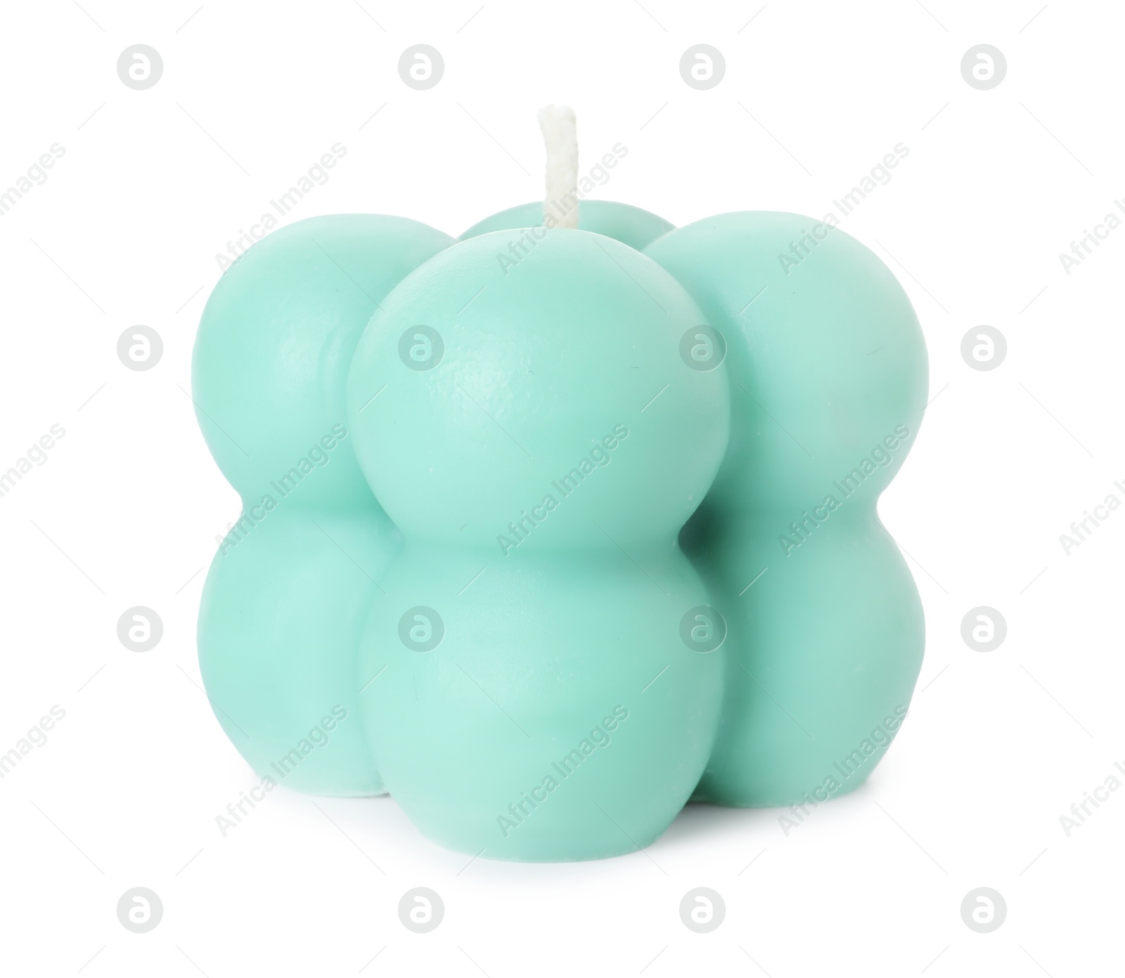 Photo of One turquoise bubble candle isolated on white