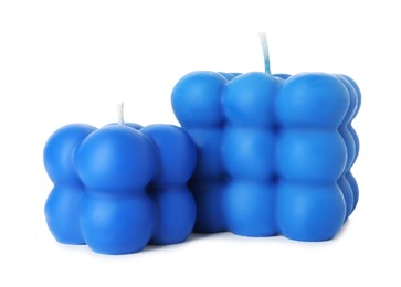 Photo of Two blue bubble candles isolated on white