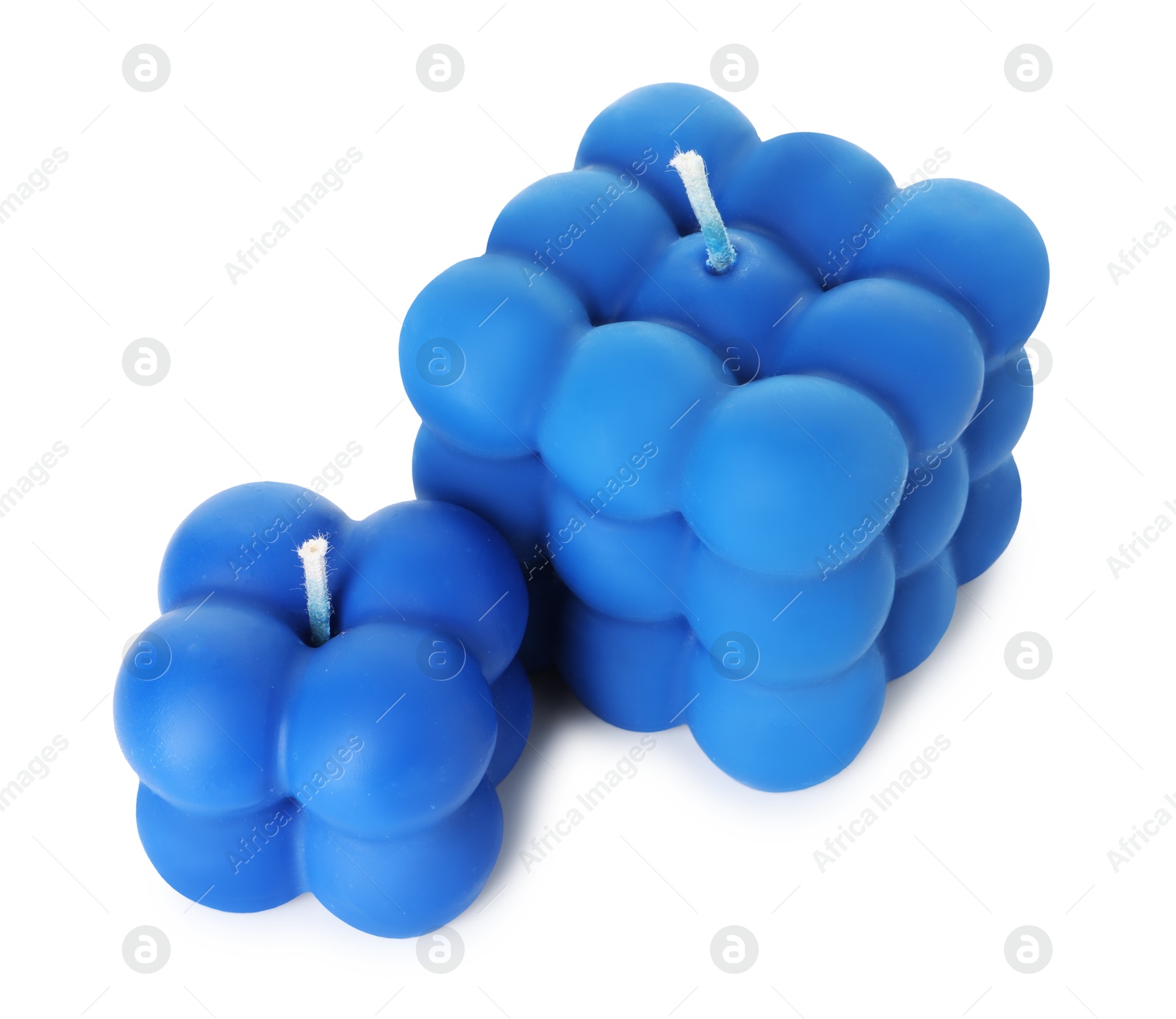 Photo of Two blue bubble candles isolated on white