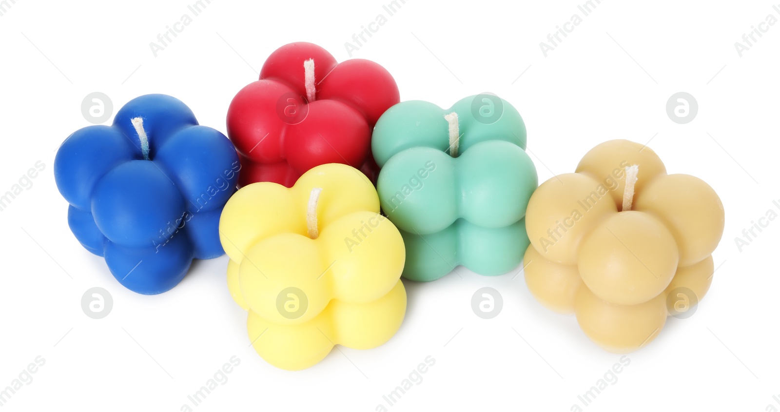 Photo of Many colorful bubble candles isolated on white