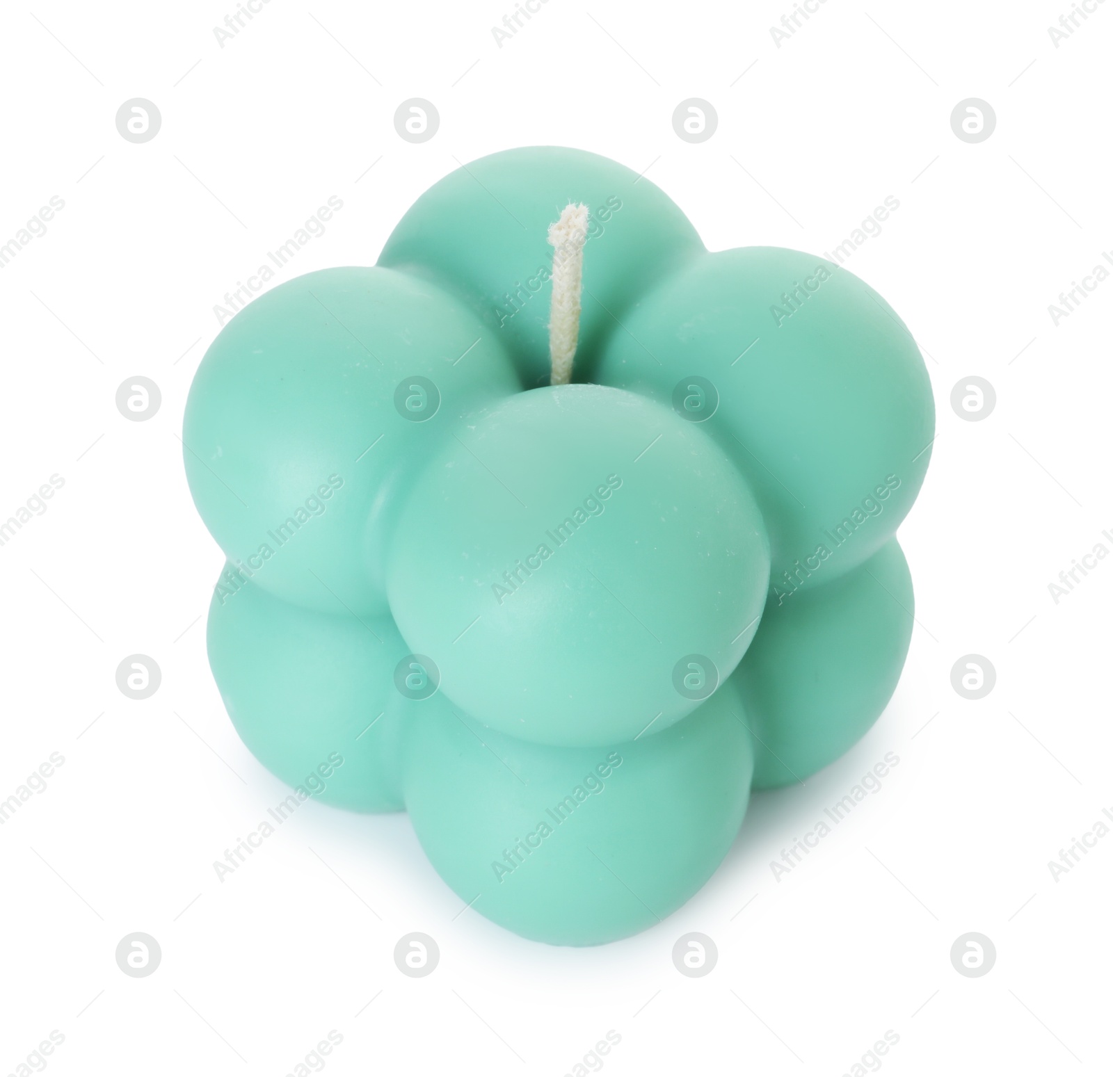 Photo of One turquoise bubble candle isolated on white