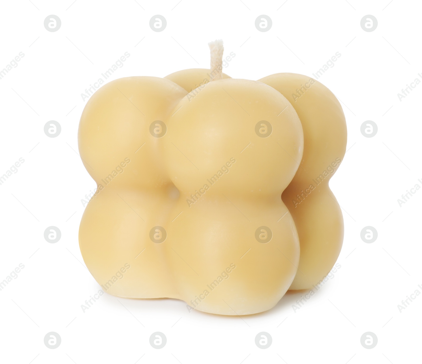 Photo of One beige bubble candle isolated on white