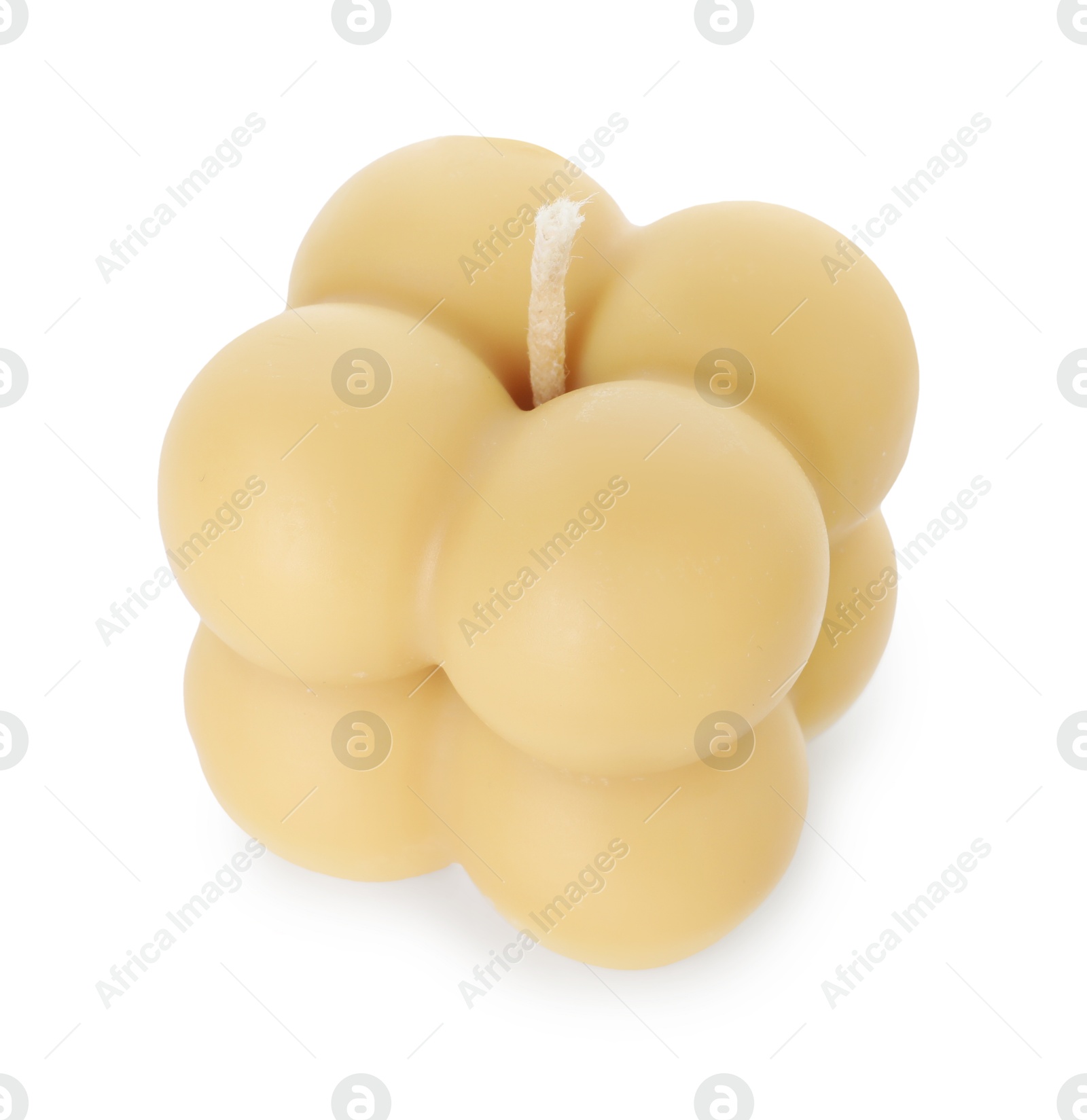 Photo of One beige bubble candle isolated on white