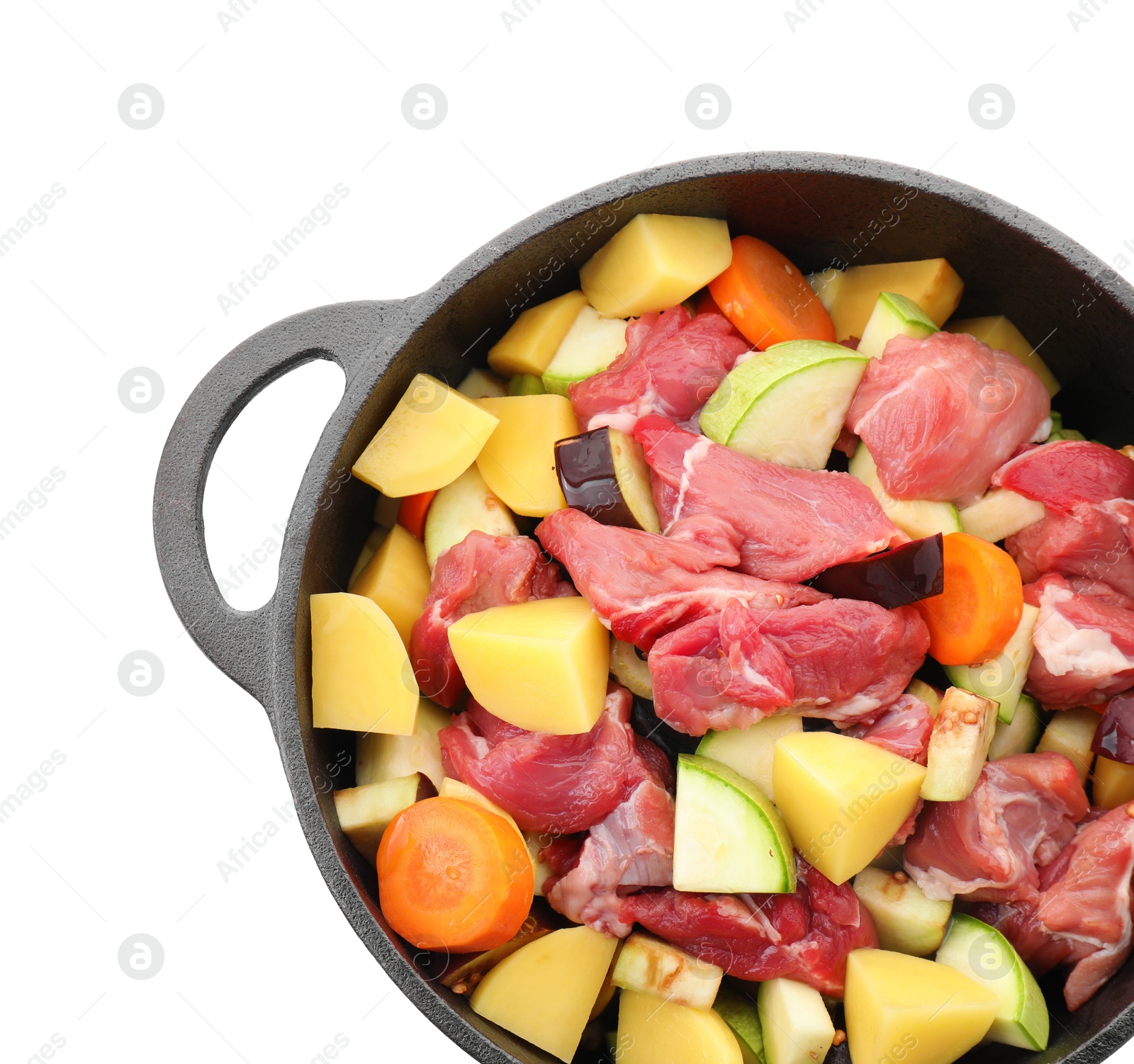 Photo of Cooking stew. Uncooked meat and vegetables in pot isolated on white, top view