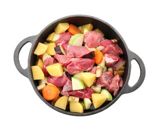 Cooking stew. Uncooked meat and vegetables in pot isolated on white, top view