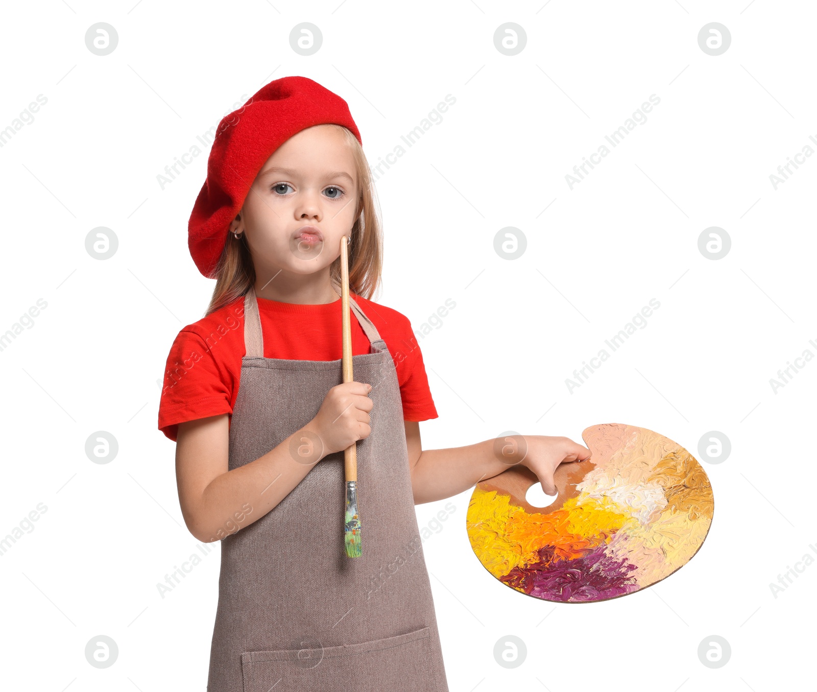 Photo of Little girl with brush and palette pretending to be artist on white background. Dreaming of future profession