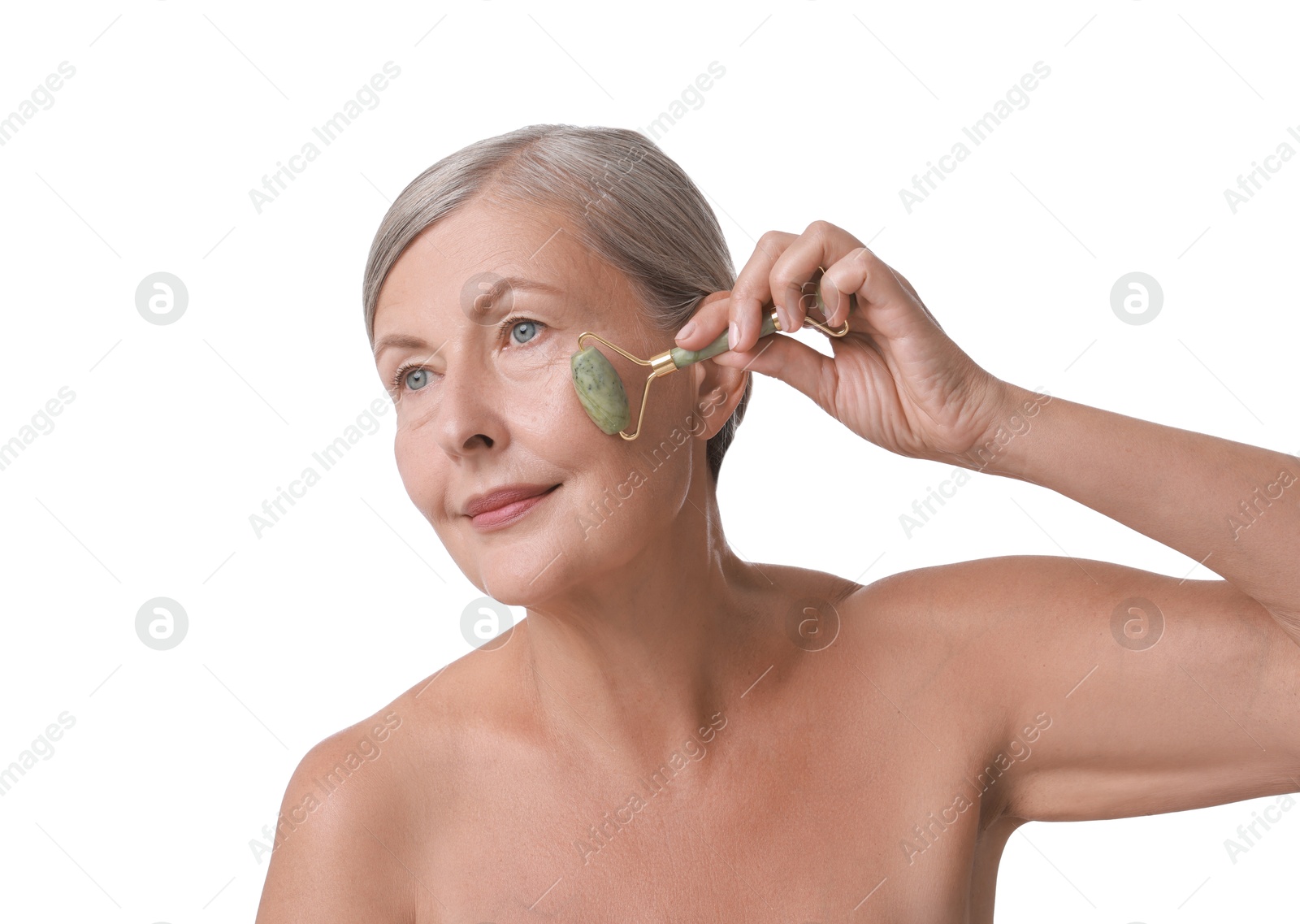 Photo of Beautiful woman doing facial massage with roller on white background