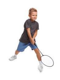 Little boy with badminton racket on white background