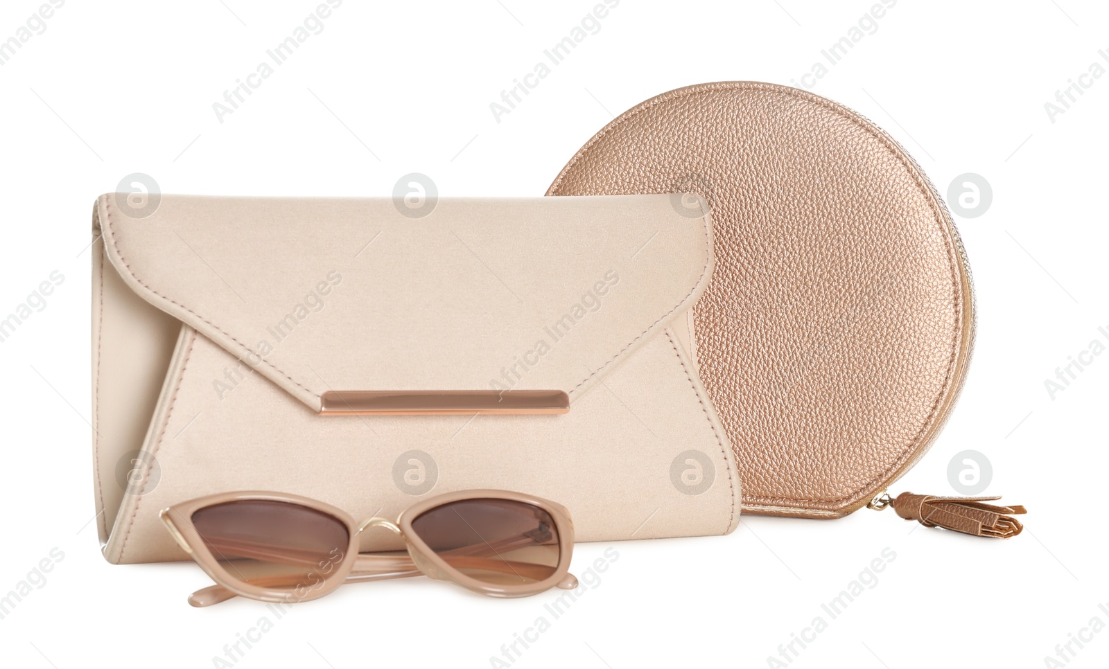 Photo of Different stylish woman's bags and sunglasses isolated on white