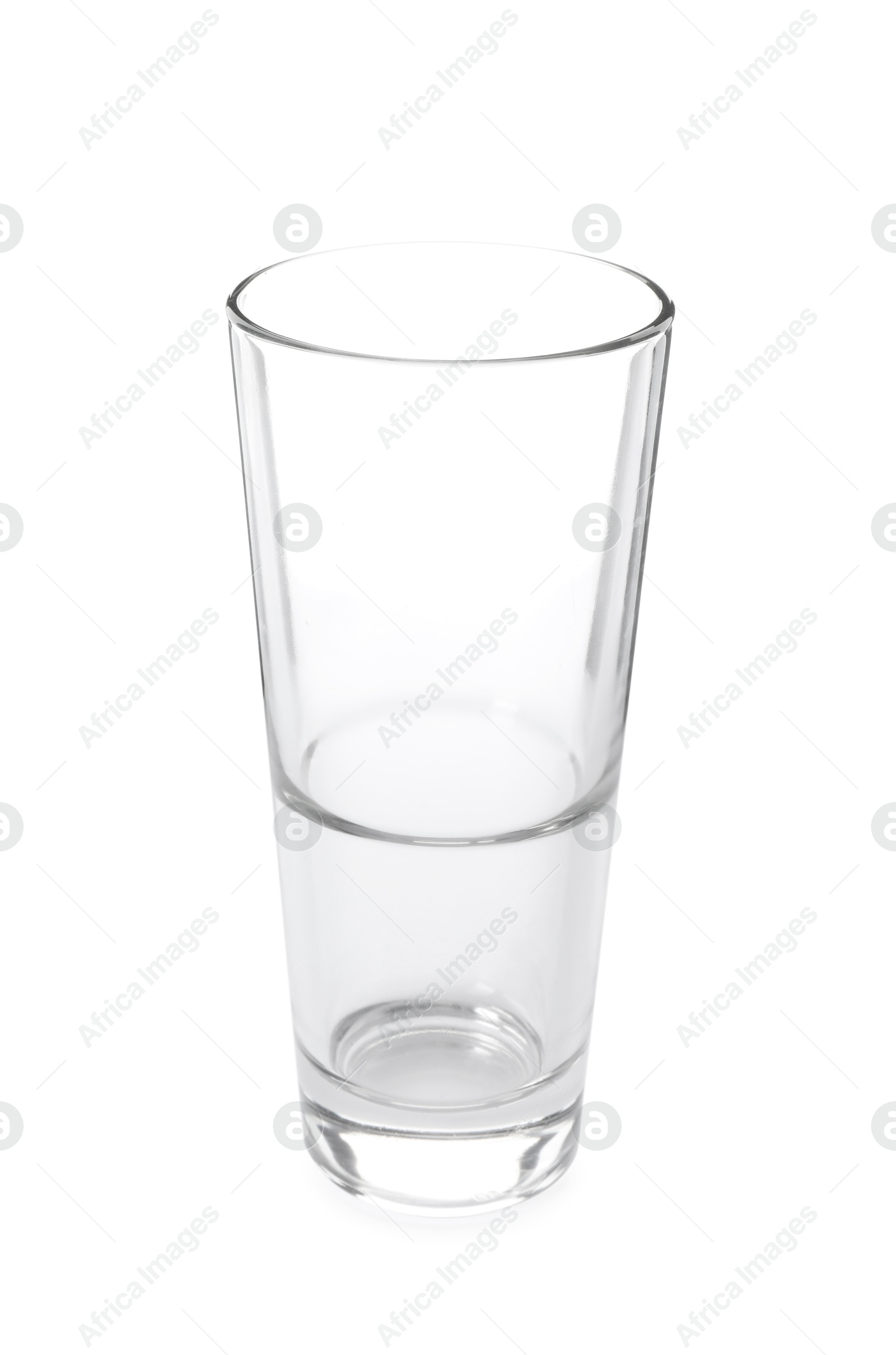 Photo of One empty clean glass isolated on white