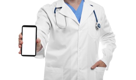 Photo of Doctor showing smartphone with blank screen on white background, closeup. Mockup for design