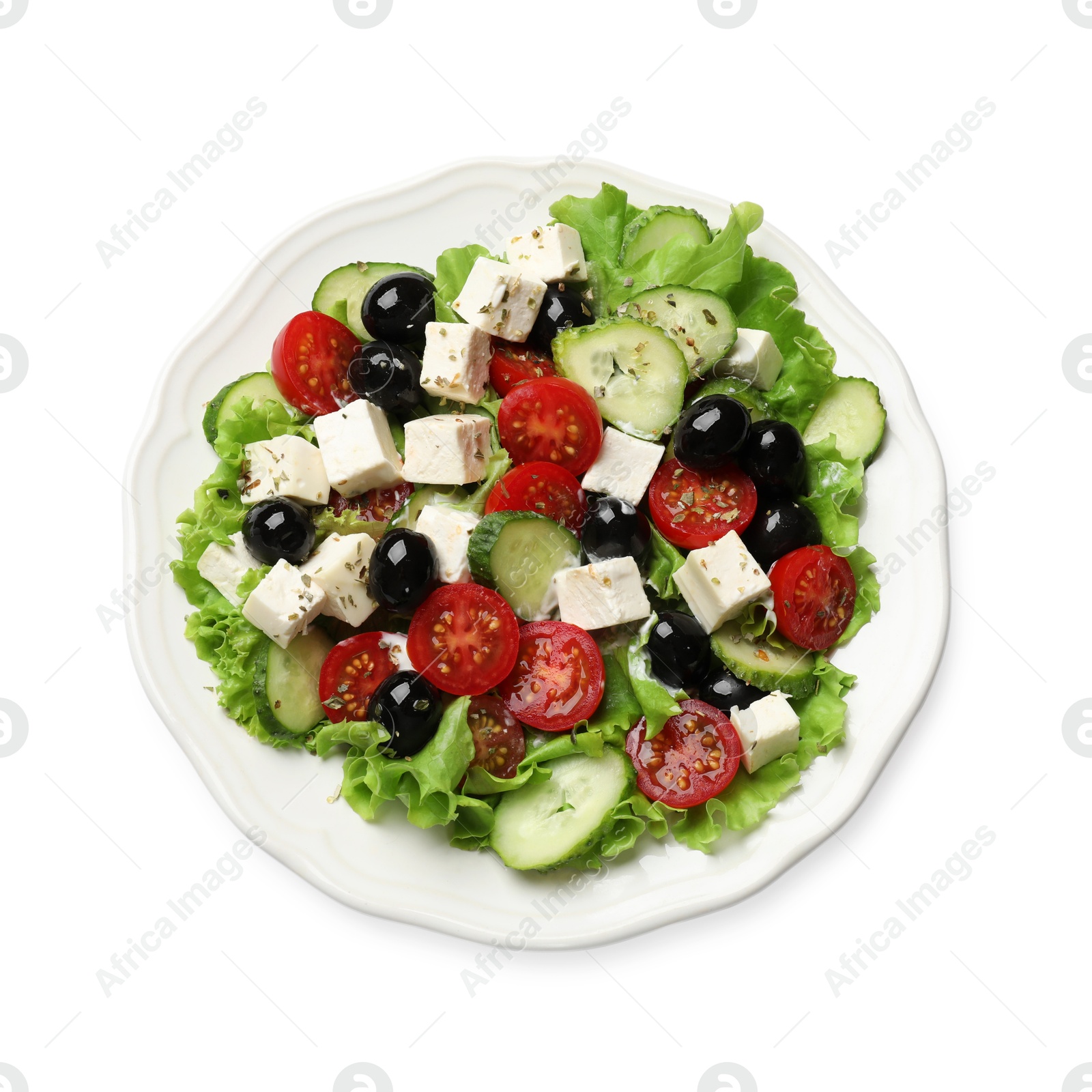 Photo of Delicious salad with feta cheese and ingredients isolated on white, top view