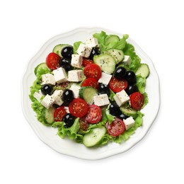 Photo of Delicious salad with feta cheese and ingredients isolated on white, top view