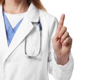 Photo of Doctor with stethoscope pointing at something on white background, closeup