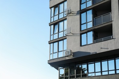 Photo of Exterior of modern building against blue sky