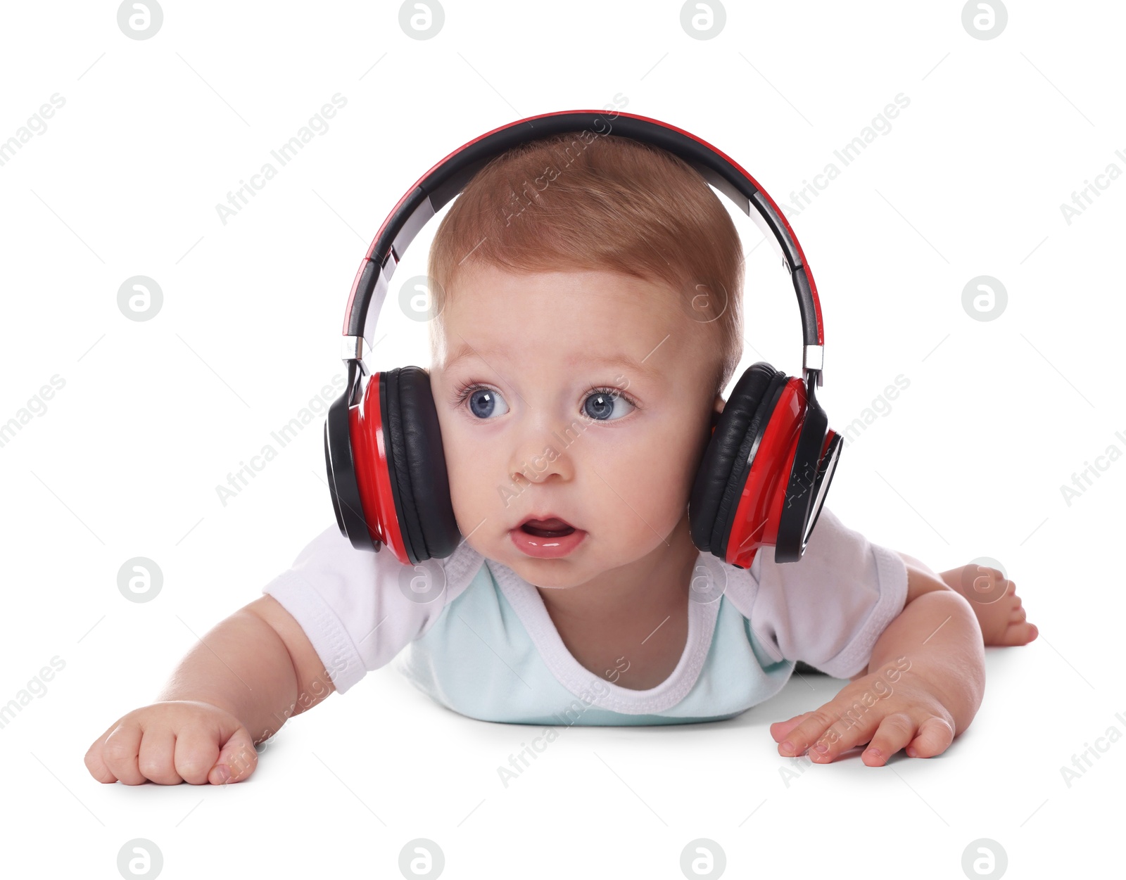 Photo of Cute little baby with headphones on white background