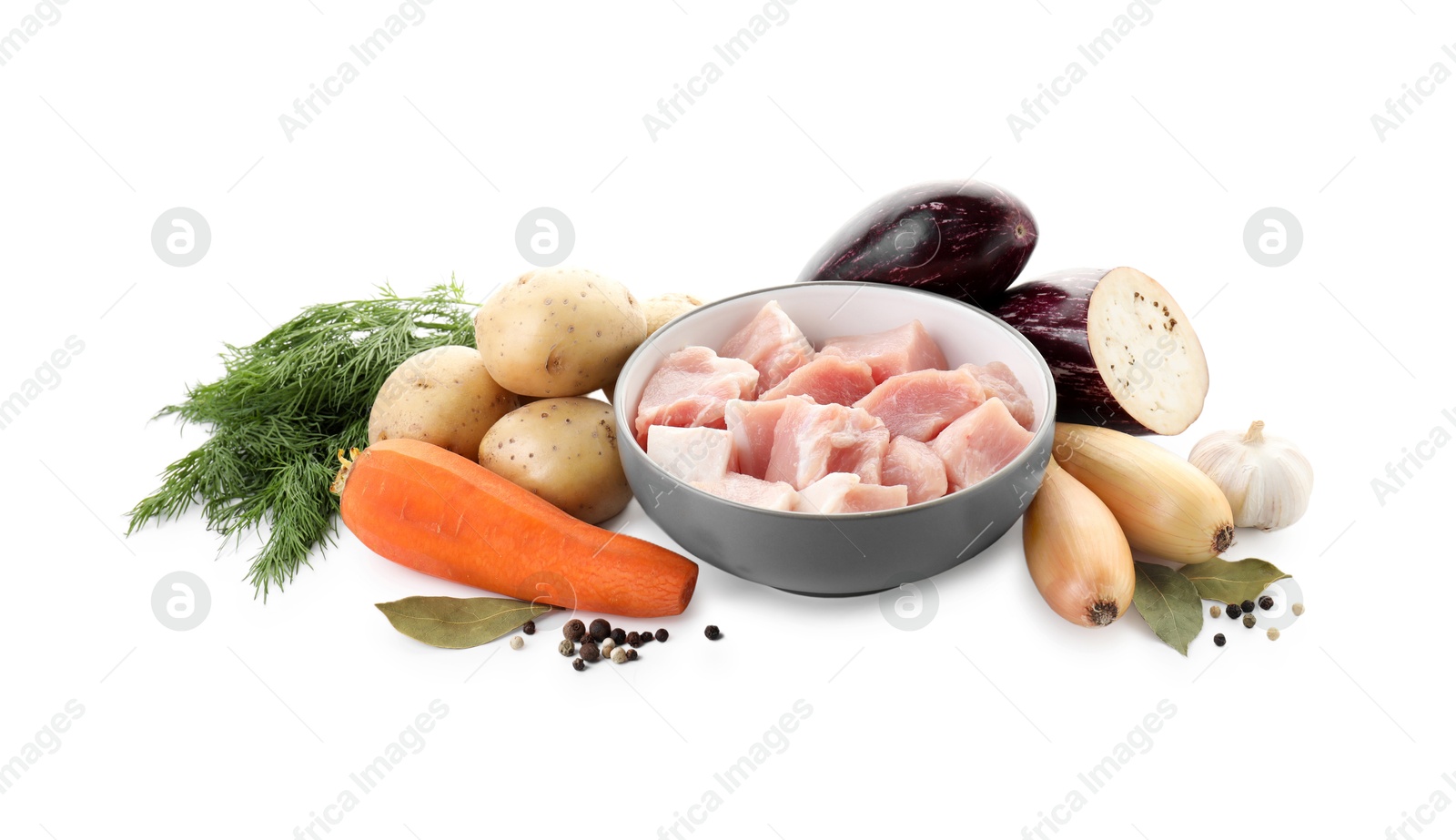 Photo of Uncooked ingredients for stew isolated on white