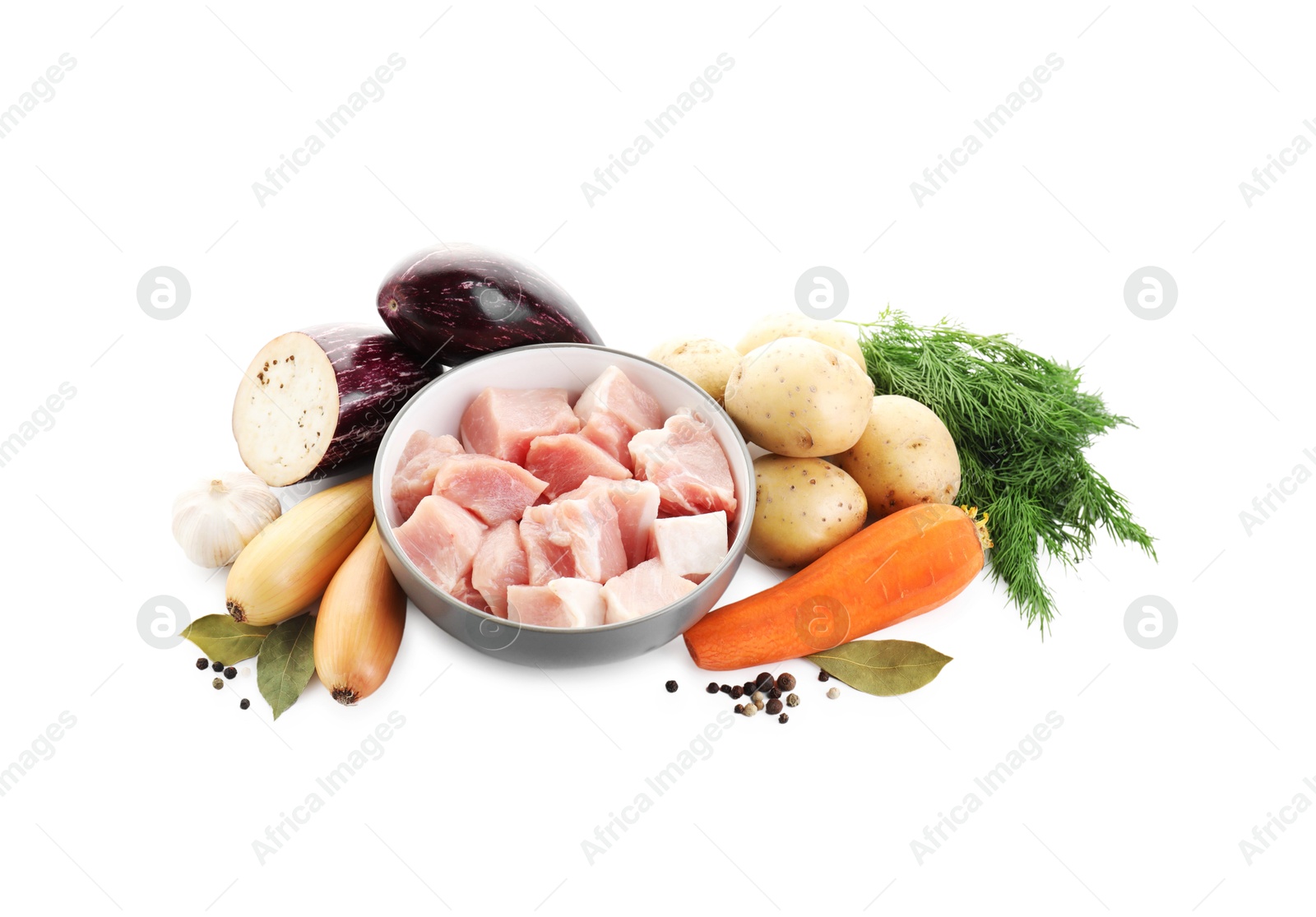 Photo of Uncooked ingredients for stew isolated on white