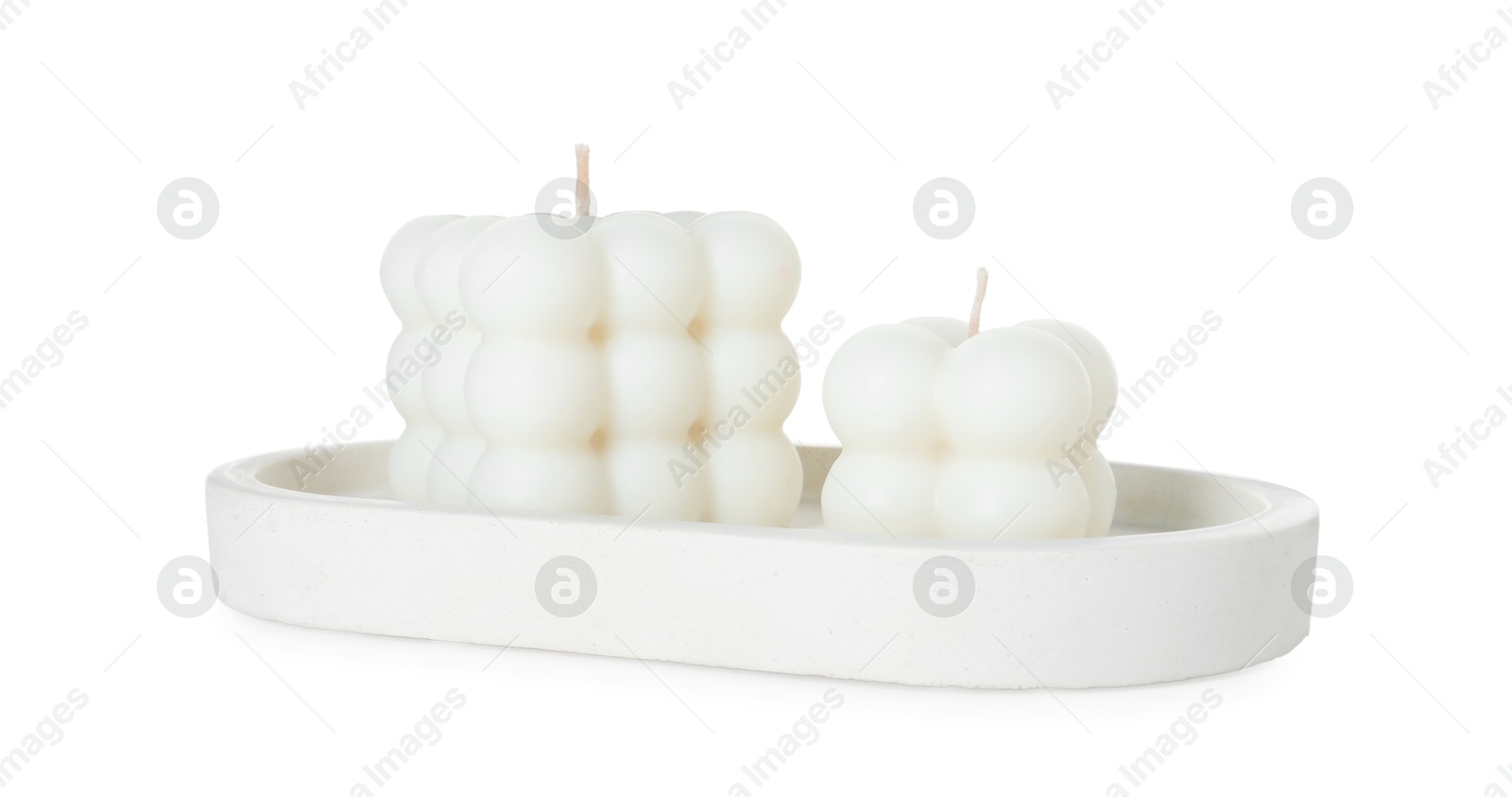 Photo of Two beautiful bubble candles isolated on white