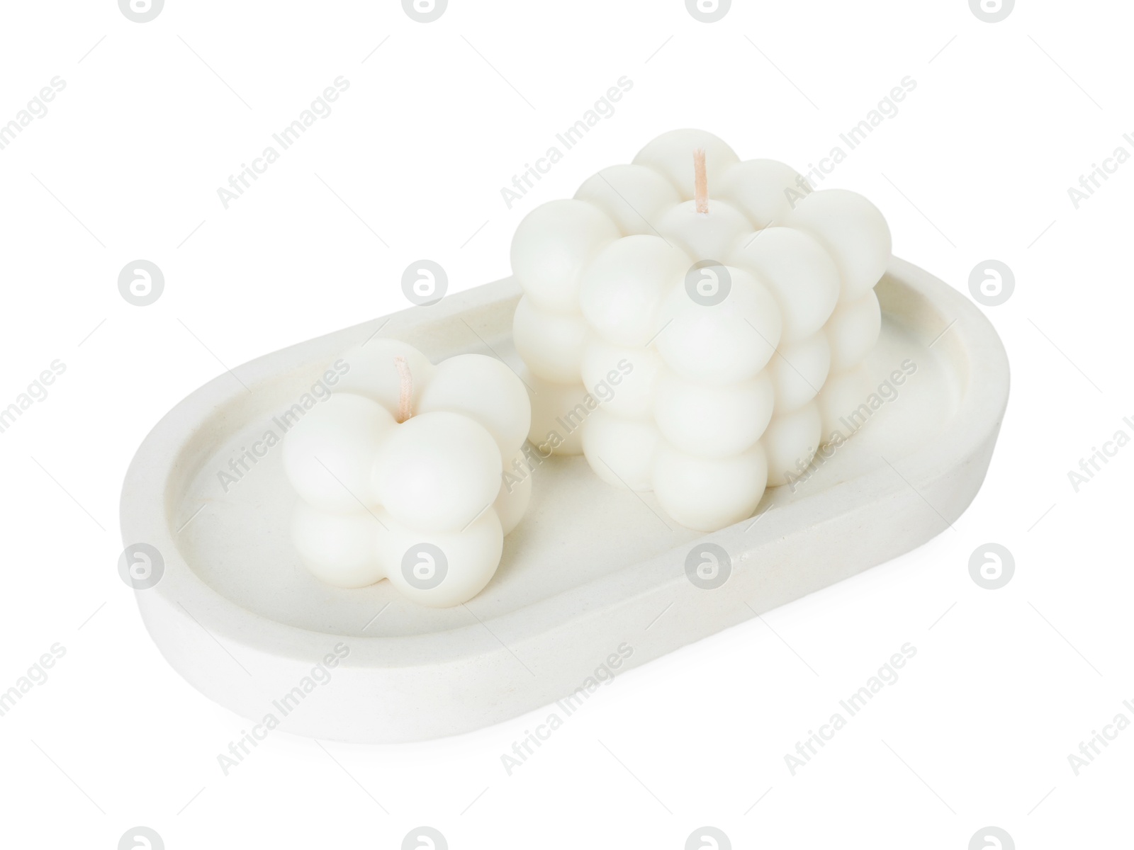 Photo of Two beautiful bubble candles isolated on white