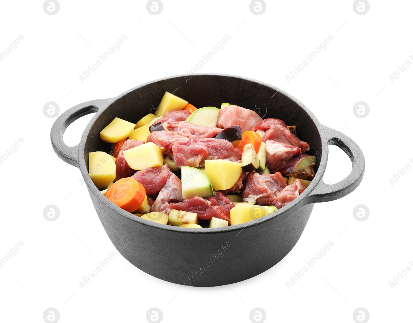 Photo of Cooking stew. Uncooked meat and vegetables in pot isolated on white