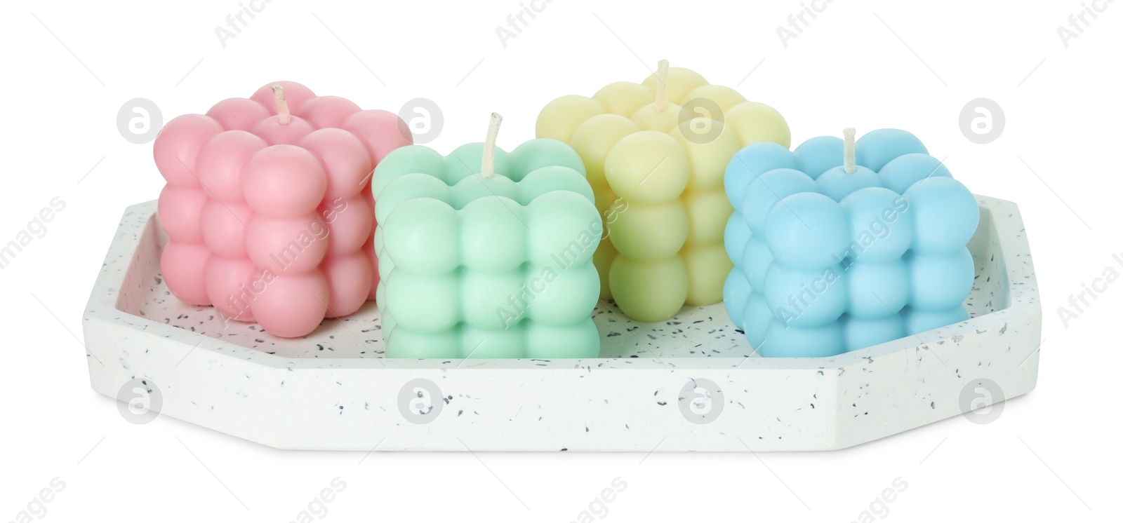 Photo of Many beautiful bubble candles isolated on white