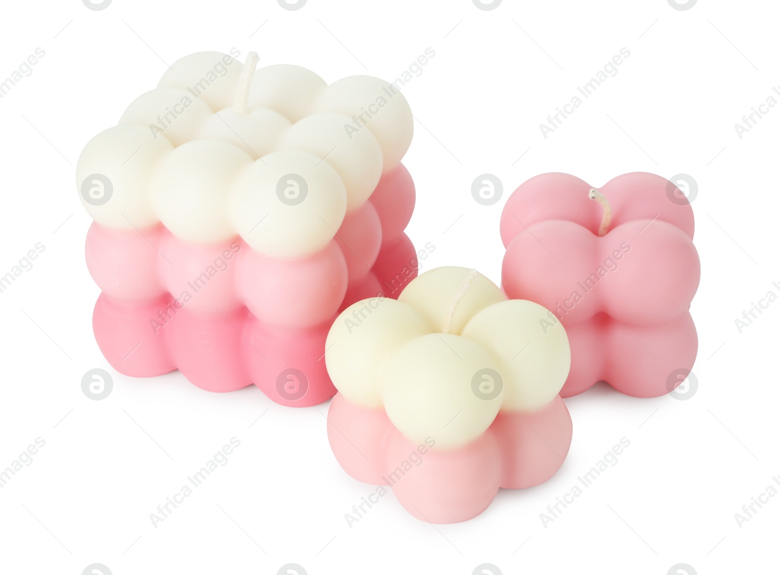 Photo of Three beautiful bubble candles isolated on white