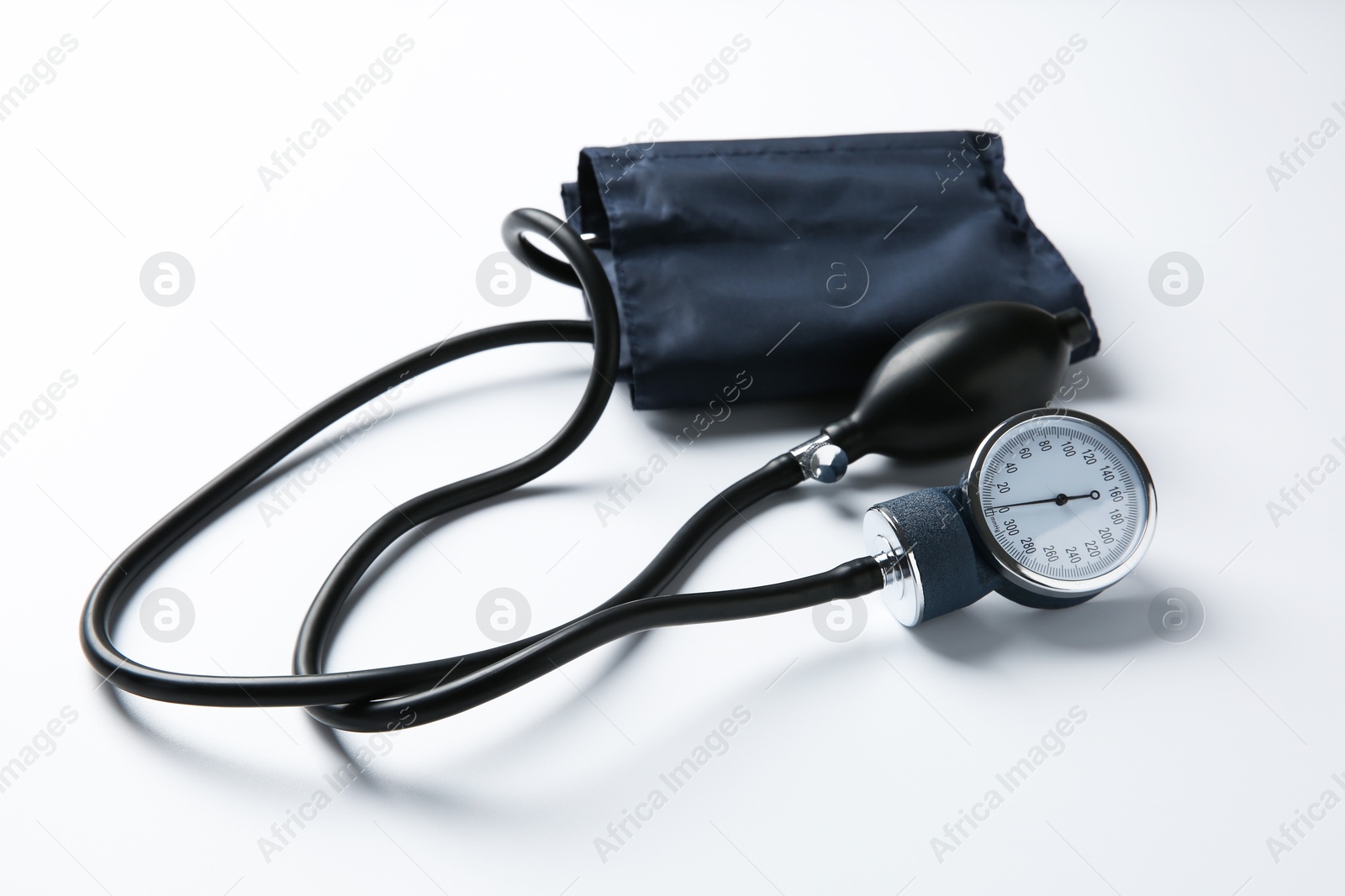 Photo of Blood pressure measuring device on light background