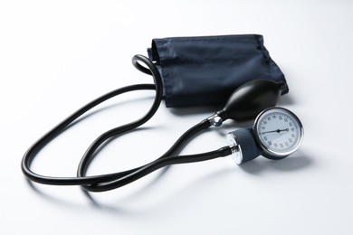 Blood pressure measuring device on light background