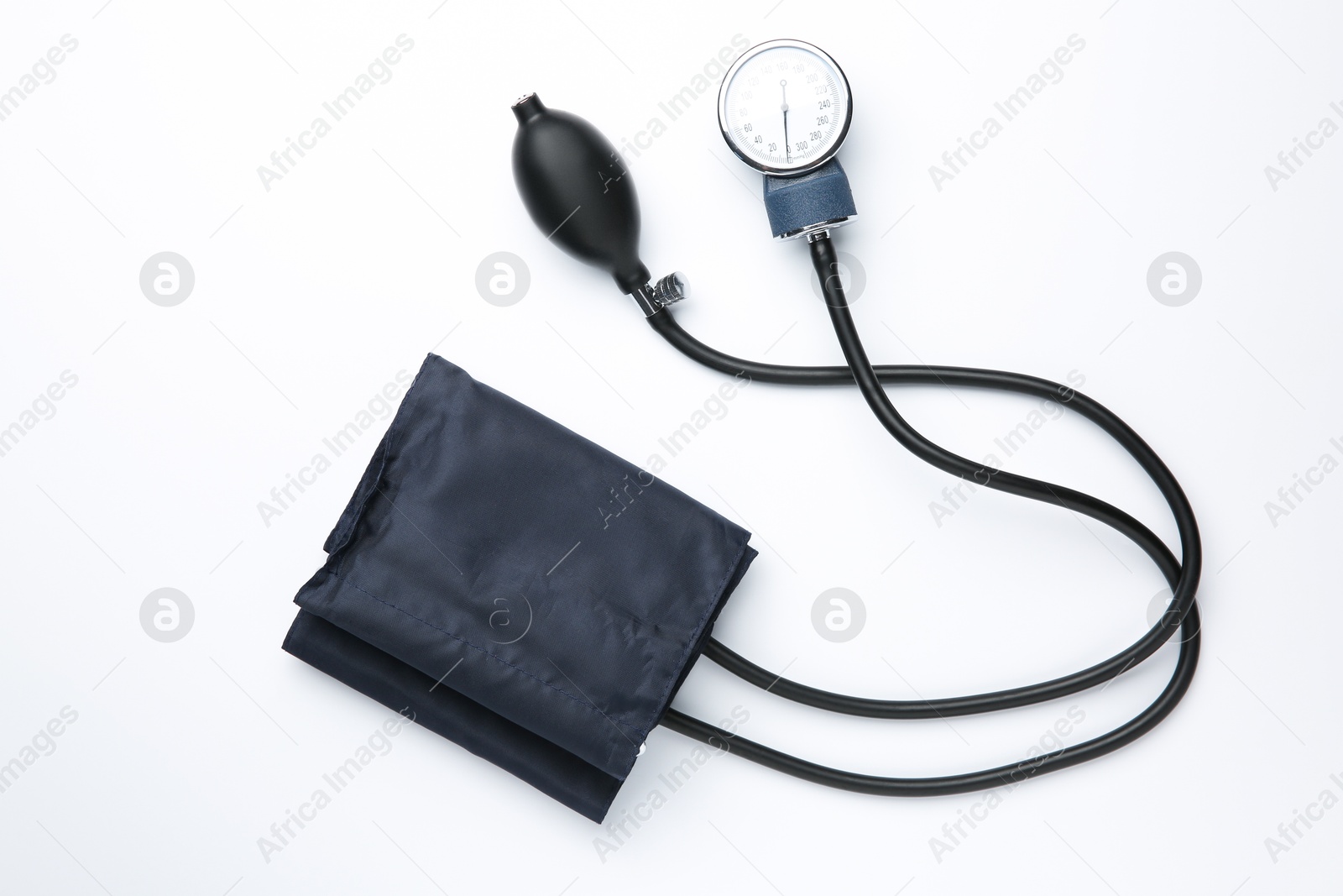 Photo of Blood pressure measuring device on light background, top view