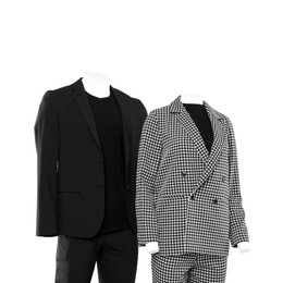 Photo of Female and male mannequins with stylish outfits isolated on white