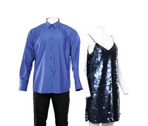 Photo of Female and male mannequins with stylish outfits on light background