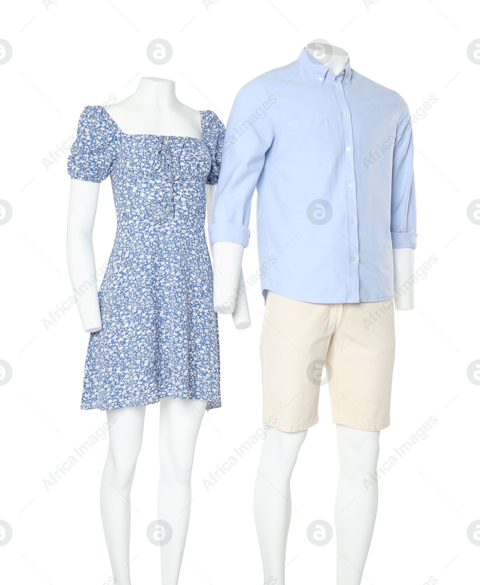 Photo of Female and male mannequins with stylish outfits isolated on white