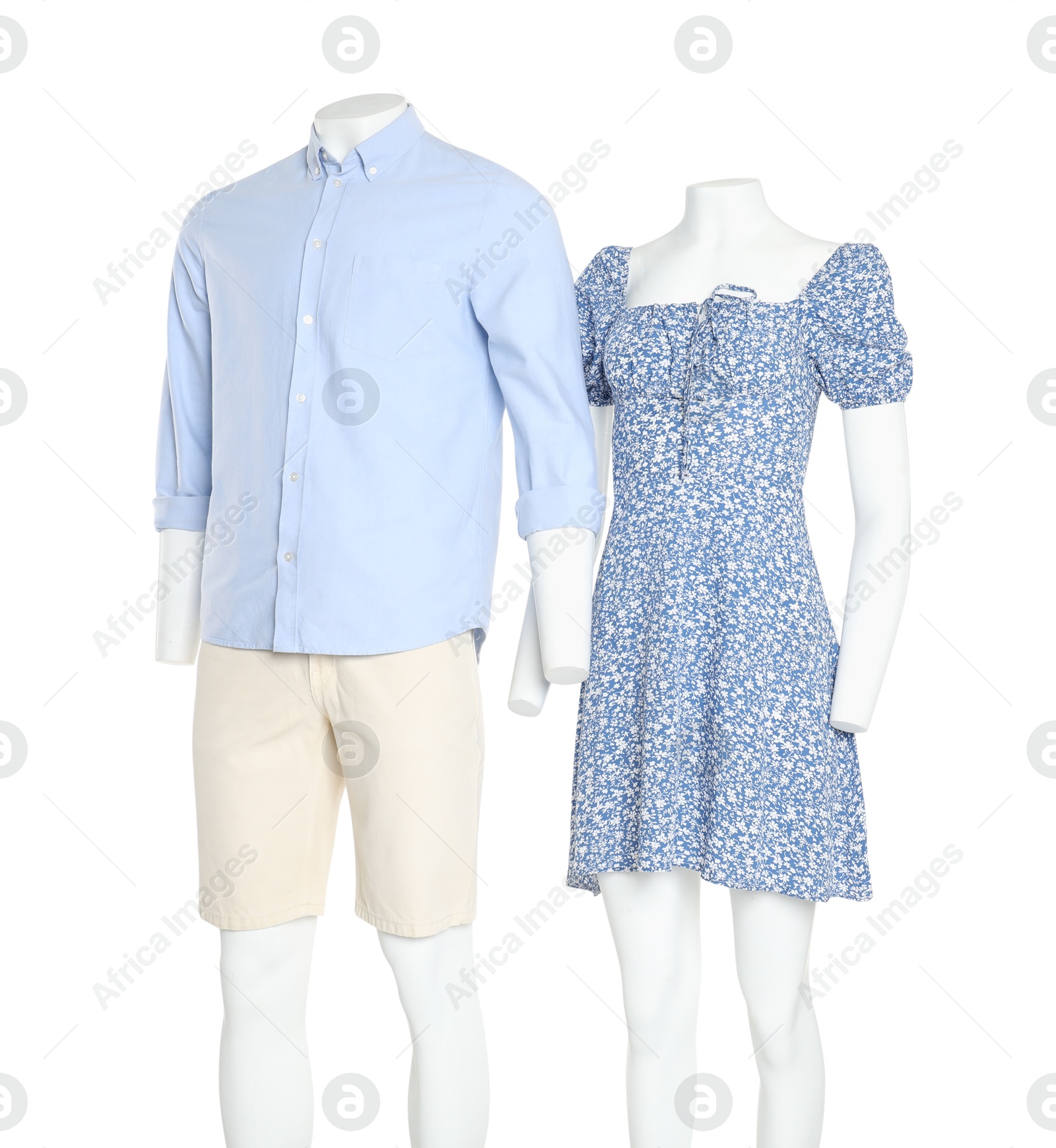 Photo of Female and male mannequins with stylish outfits isolated on white