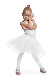 Little girl pretending to be ballerina on white background. Dreaming of future profession