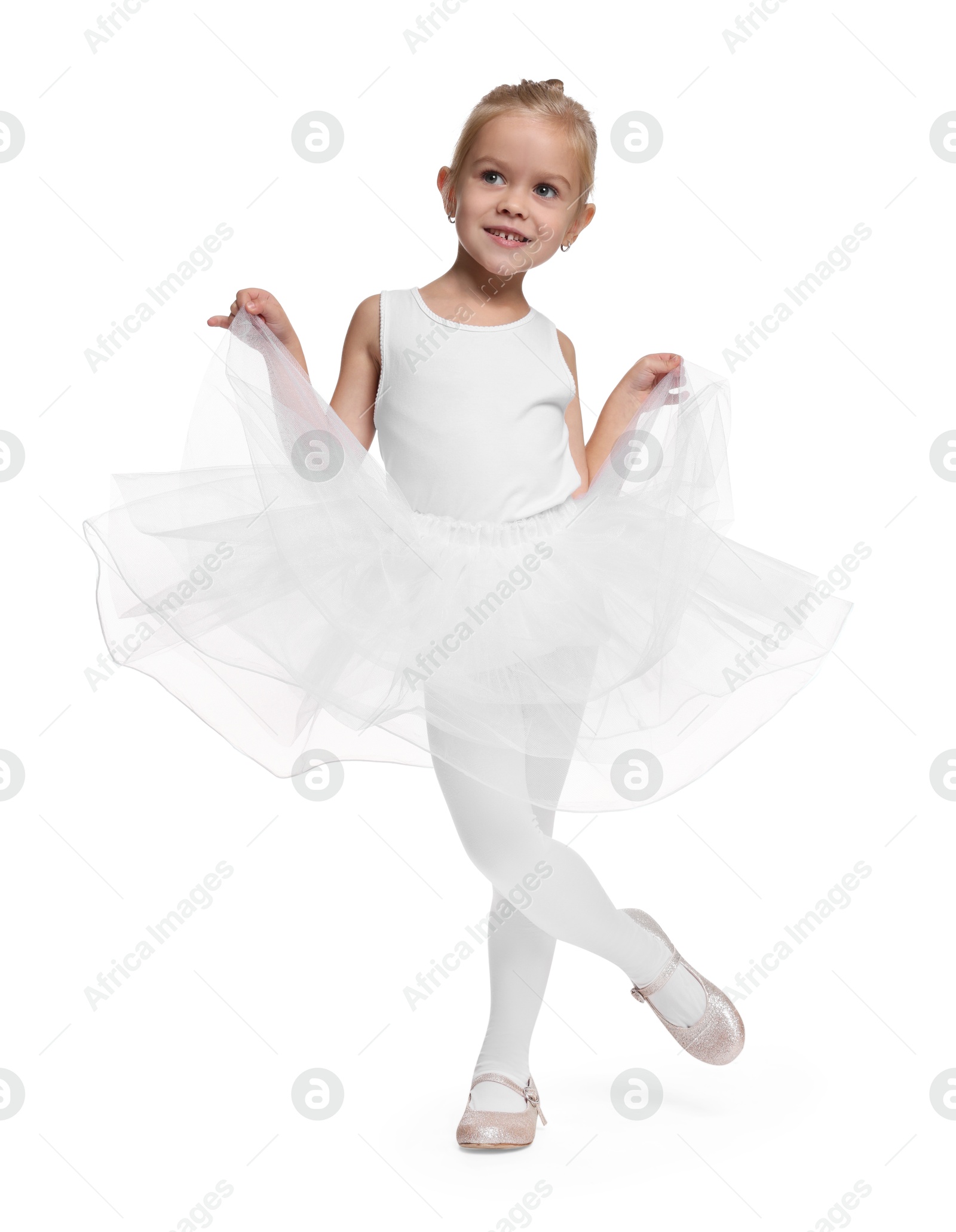 Photo of Little girl pretending to be ballerina on white background. Dreaming of future profession