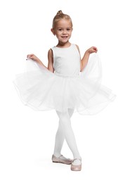 Little girl pretending to be ballerina on white background. Dreaming of future profession