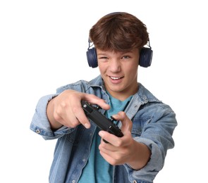 Teenage boy in headphones playing video game with controller on white background