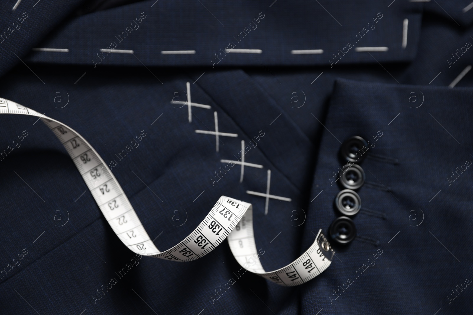 Photo of Semi-ready jacket and measuring tape, top view