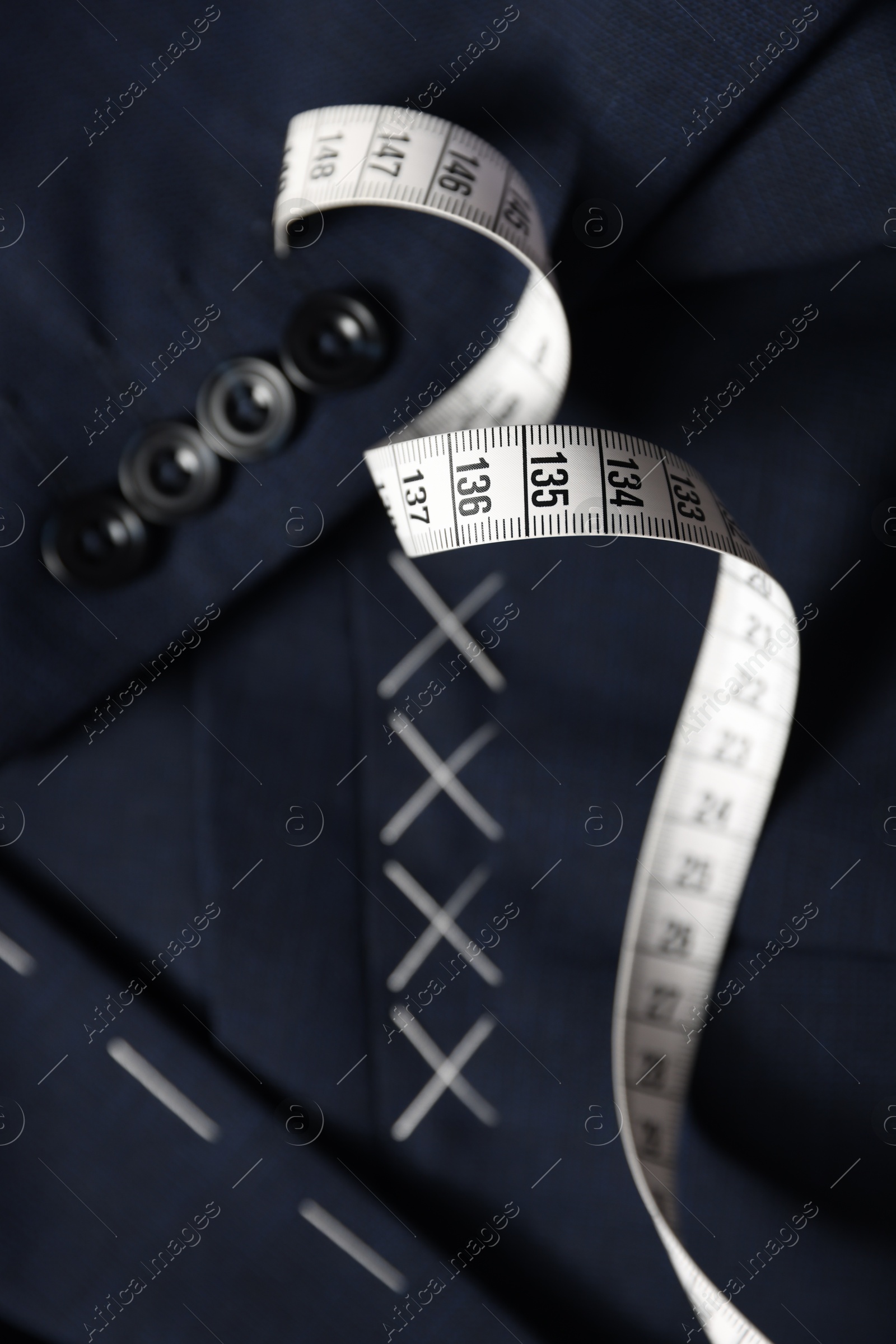 Photo of Semi-ready jacket and measuring tape, top view