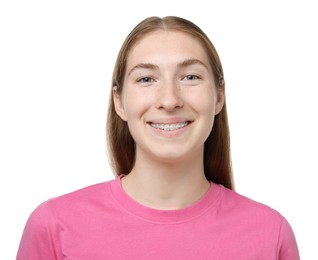 Photo of Smiling girl with braces on white background