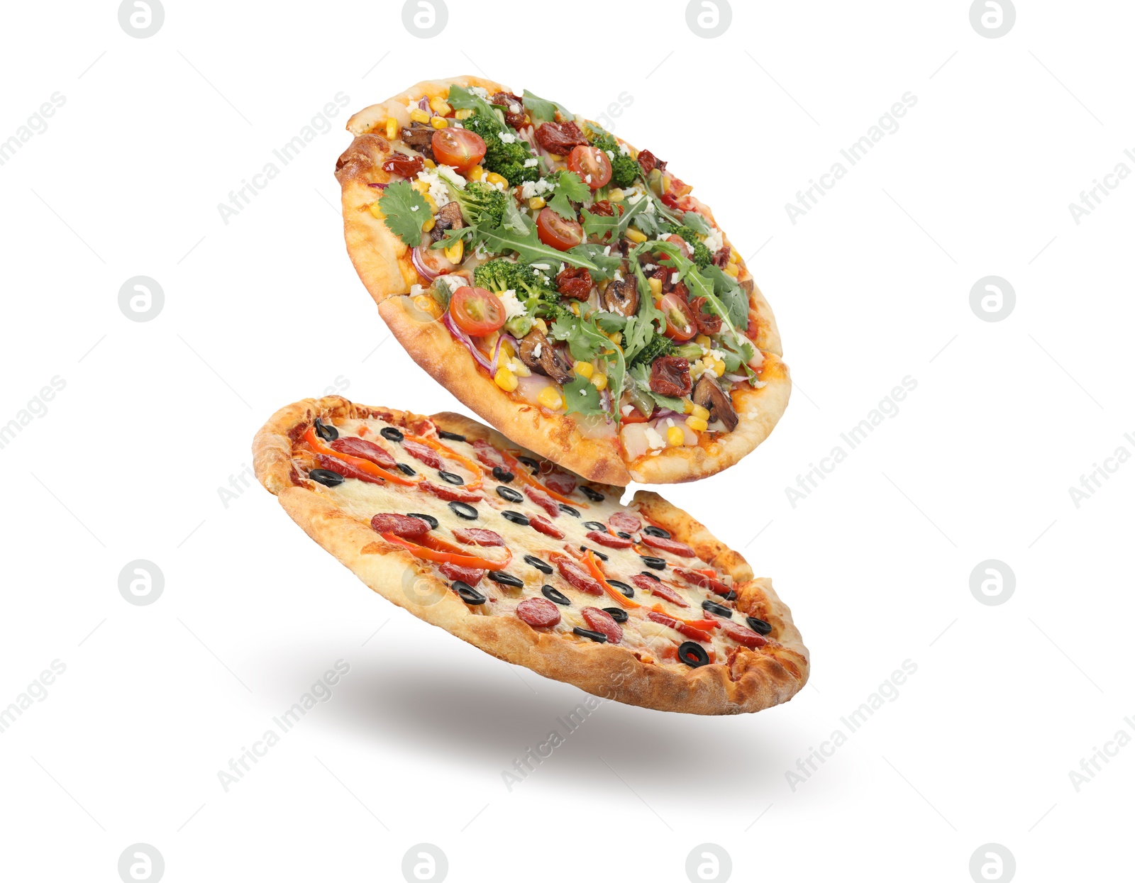 Image of Different pizzas in air on white background