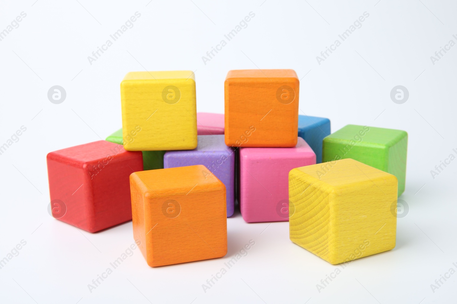 Photo of Many wooden colorful cubes on white background