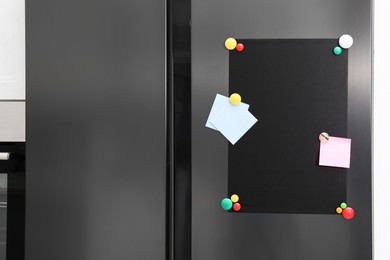 Magnetic board and notes on refrigerator in kitchen