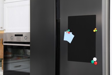 Magnetic board and notes on refrigerator in kitchen